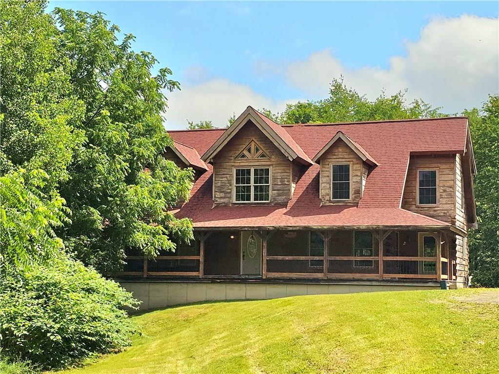 459 Big Knob Road Rochester, PA 15074 - Photo 1 of 48 a front view of a house with swimming pool