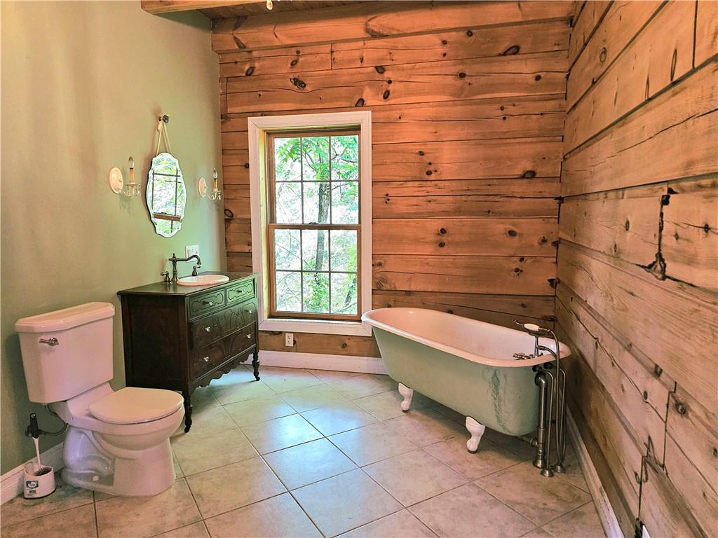 459 Big Knob Road Rochester, PA 15074 - Photo 25 of 48 a bathroom with a sink a toilet and tub