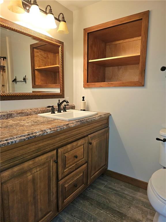 459 Big Knob Road Rochester, PA 15074 - Photo 34 of 48 a bathroom with a granite countertop toilet sink and mirror