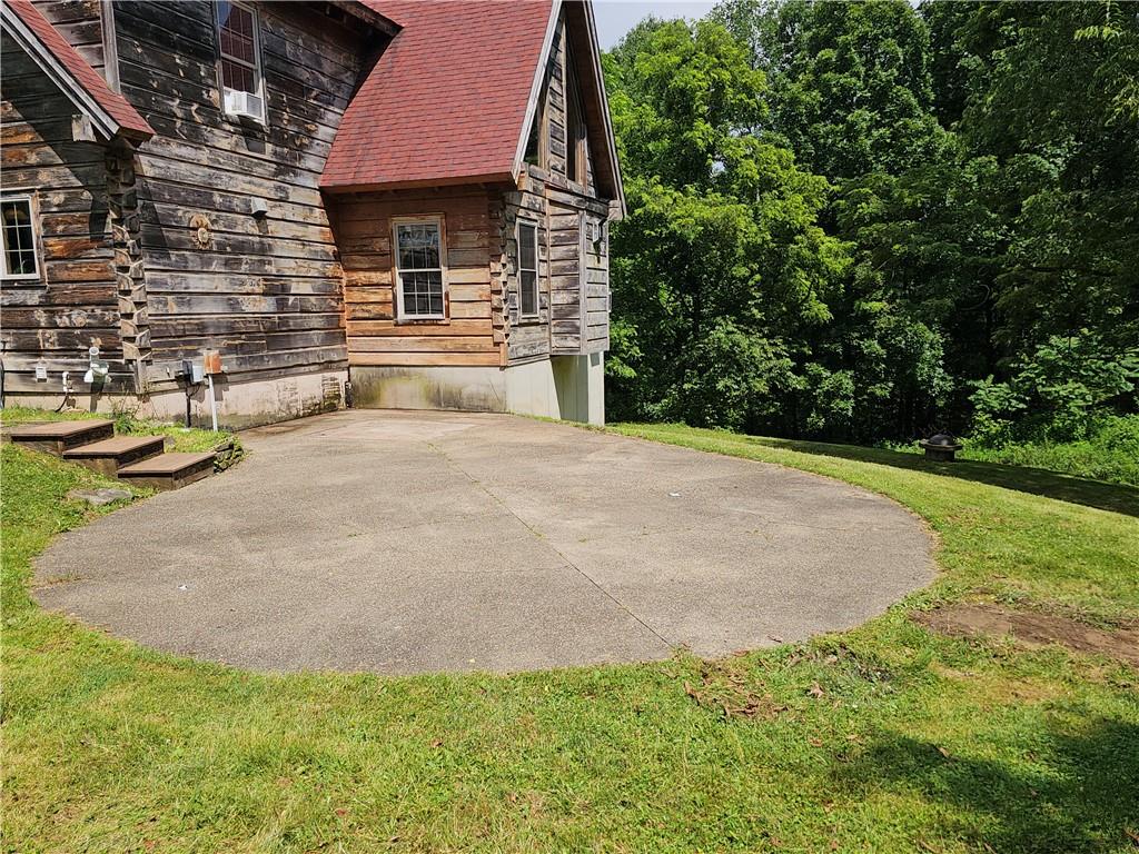 459 Big Knob Road Rochester, PA 15074 - Photo 45 of 48 a front view of a house with garden