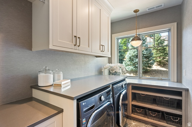 3 Carriagewood Cove, Unit 1088 Sandy, UT 84092 - Photo 38 of 79 Dedicated laundry area featuring white shaker-style cabinetry, a built-in countertop, and a window providing natural illumination
