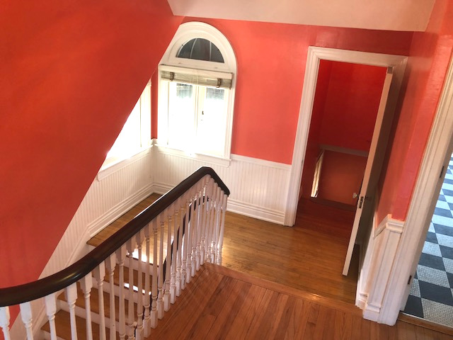 906 North Sheridan Road Waukegan, IL 60085 - Photo 15 of 34 a view of staircase with railing and white walls