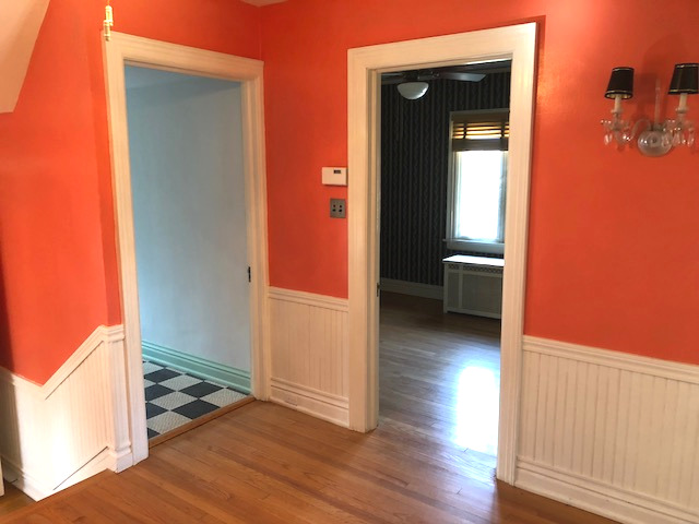 906 North Sheridan Road Waukegan, IL 60085 - Photo 16 of 34 a view of a room with wooden floor and a bathroom