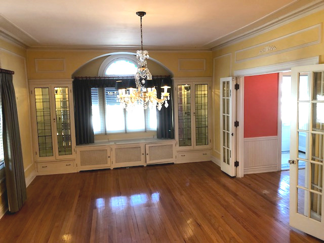 906 North Sheridan Road Waukegan, IL 60085 - Photo 9 of 34 a view of a room with wooden floor chandeliers and outdoor space