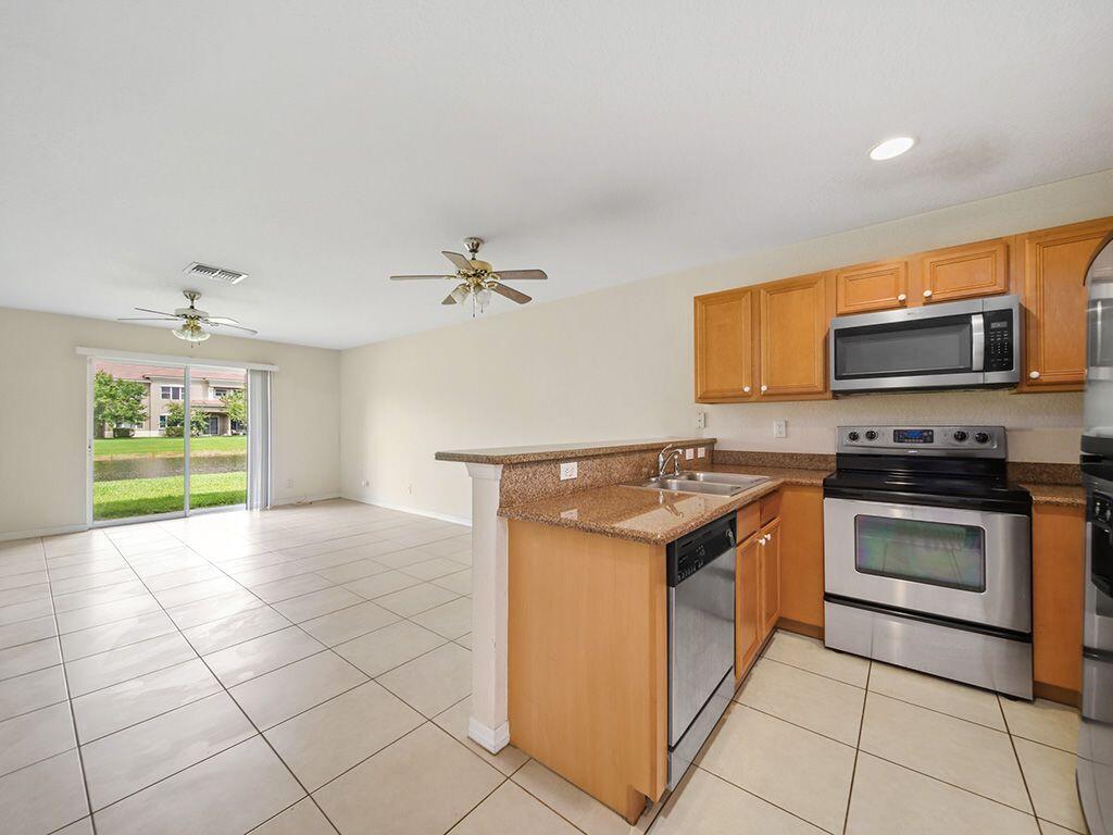 2223 Rockport Road Port St. Lucie, FL 34953 - Photo 3 of 25 Kitchen-living area