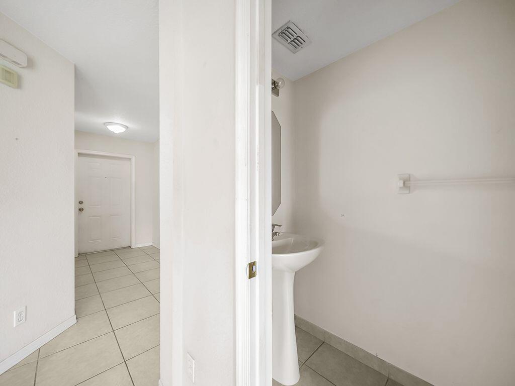 2223 Rockport Road Port St. Lucie, FL 34953 - Photo 6 of 25 Half bath