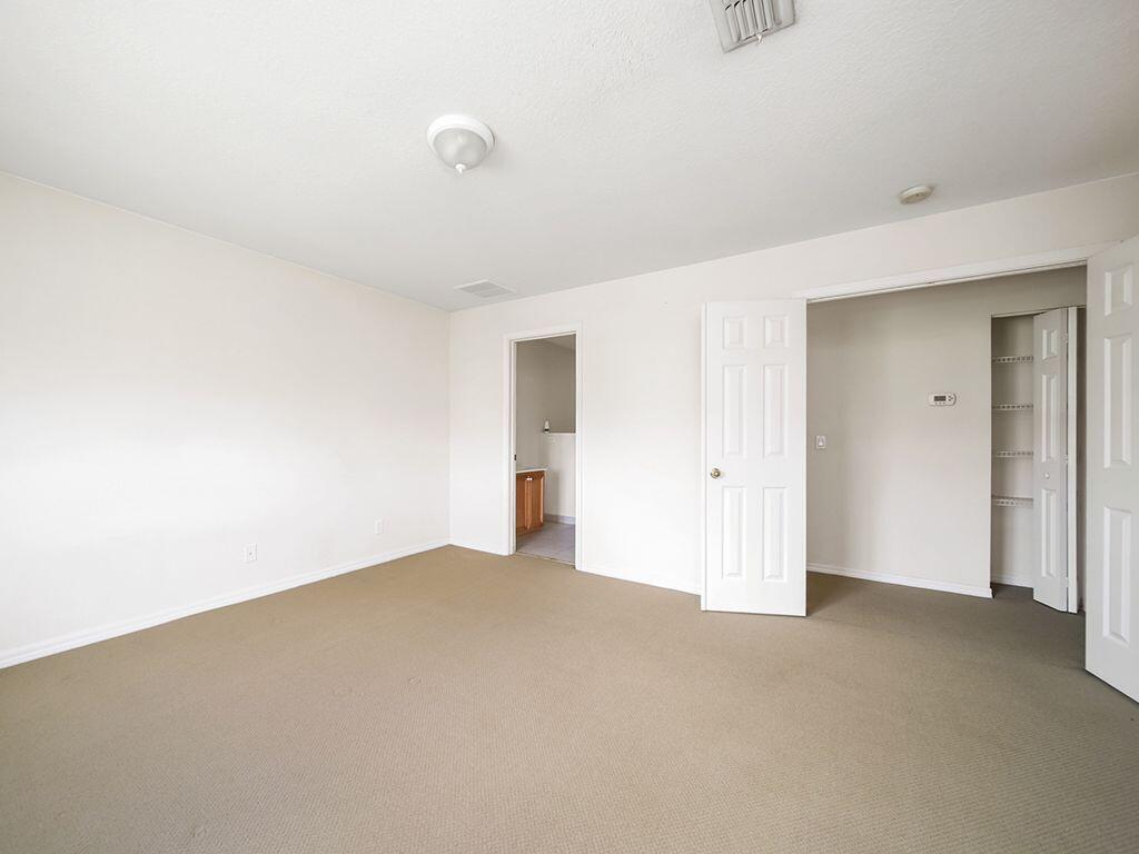 2223 Rockport Road Port St. Lucie, FL 34953 - Photo 7 of 25 Master bedroom