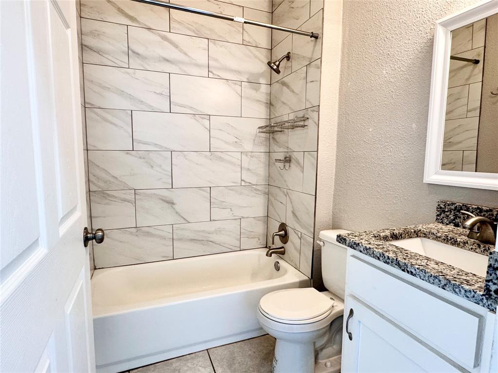 3455 Roberts Avenue Dallas, TX 75215 - Photo 17 of 25 a bathroom with a sink toilet and shower