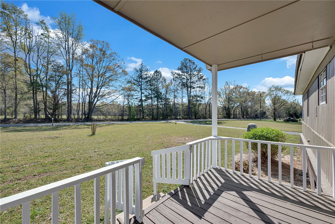220 Bill Kay Road Belton, SC 29627 - Photo 28 of 30 Enjoy the expansive views from this charming covered porch, offering a peaceful outdoor retreat.