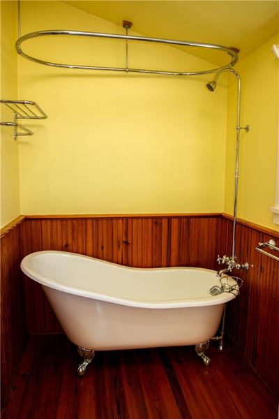 187 McMichael Road Carnegie, PA 15106 - Photo 14 of 25 MAIN BATH. Soak in this charming Claw-foot Tub, surrounded by Hard woods on Walls and Floor. A lovely Marble Sink graces the other end of the room.