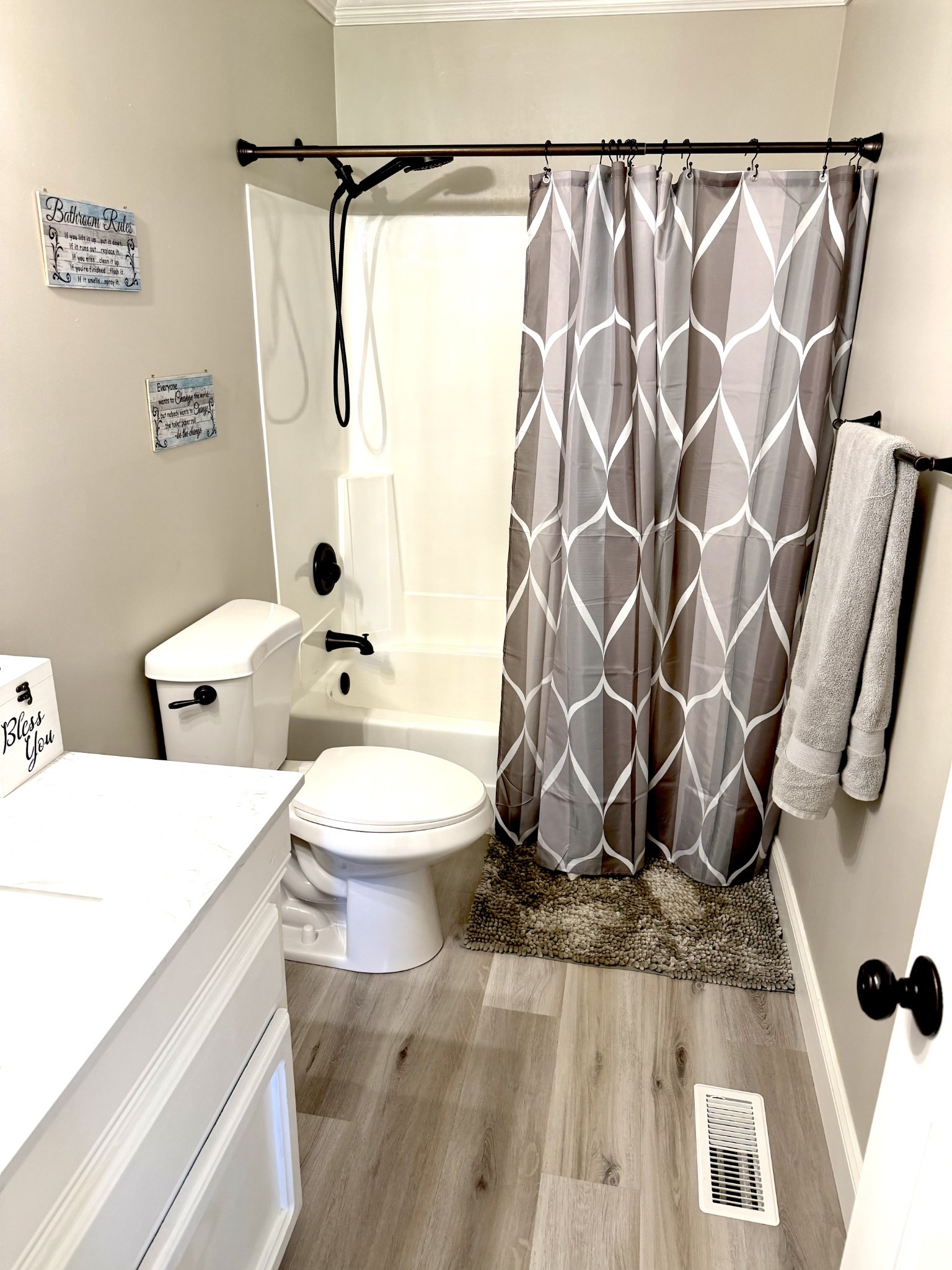 356 Lee Road Cottontown, TN 37048 - Photo 19 of 52 a bathroom with a granite countertop sink toilet and a mirror