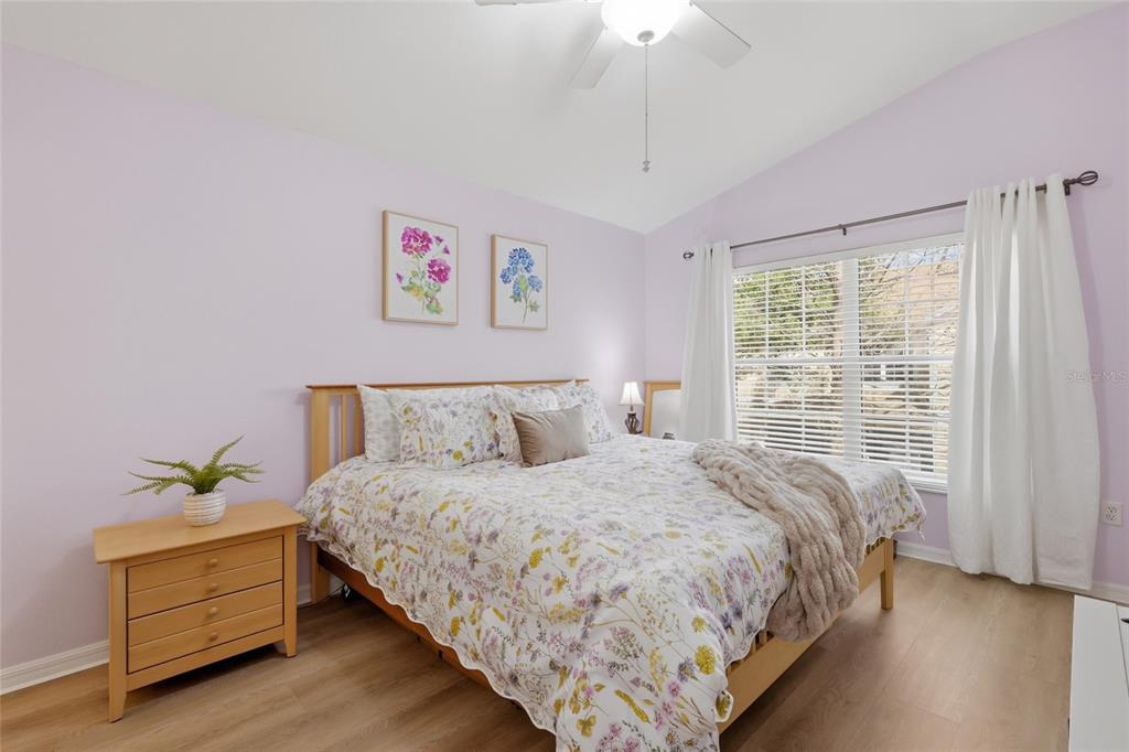 6406 Rosefinch Court, Unit 204 Lakewood Ranch, FL 34202 - Photo 15 of 36 a bedroom with a bed and a window