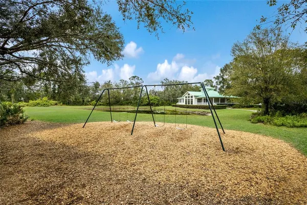 a view of a park with a houses