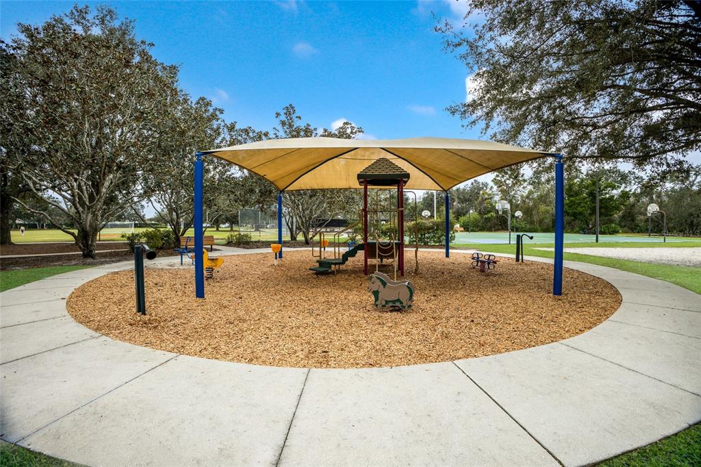 6406 Rosefinch Court, Unit 204 Lakewood Ranch, FL 34202 - Photo 34 of 36 a view of a park with slide