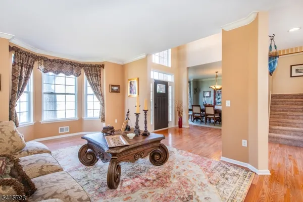 a view of a livingroom with furniture and windows