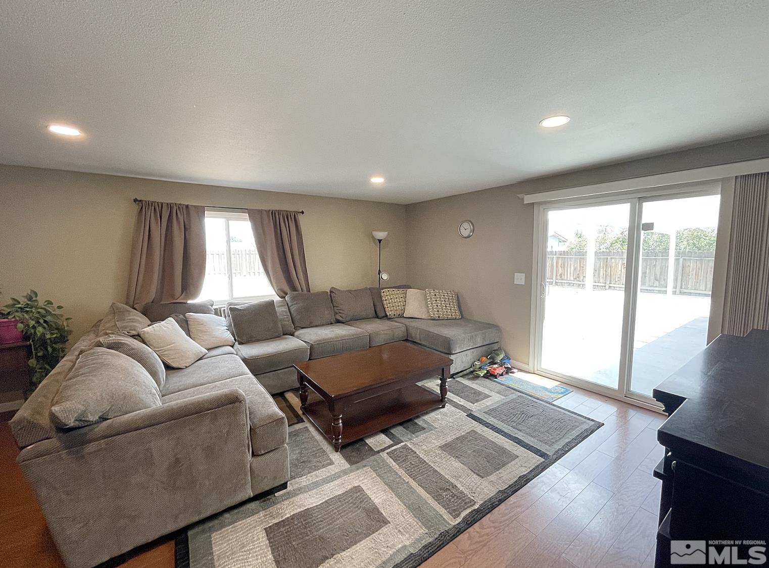 562 Yellow Jacket Road Dayton, NV 89403 - Photo 17 of 27 a living room with furniture and a window