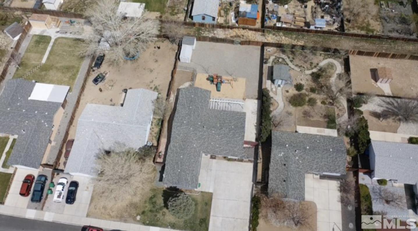 562 Yellow Jacket Road Dayton, NV 89403 - Photo 3 of 27 an aerial view of residential houses with outdoor space