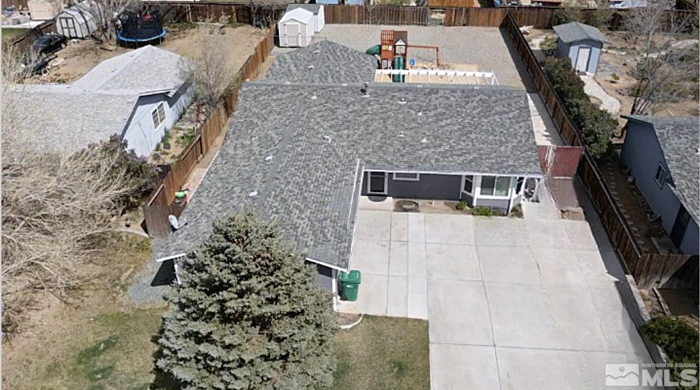562 Yellow Jacket Road Dayton, NV 89403 - Photo 4 of 27 a picture of a house with a yard