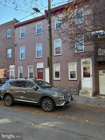 a car parked in front of a building