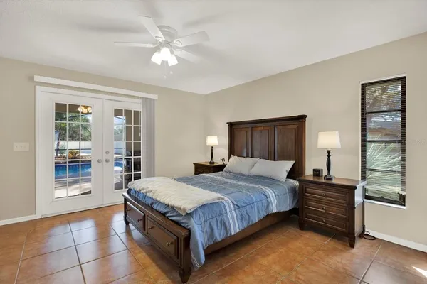 a bedroom with a bed and a cabinets