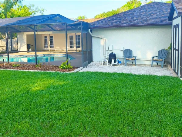 a house view with a garden space
