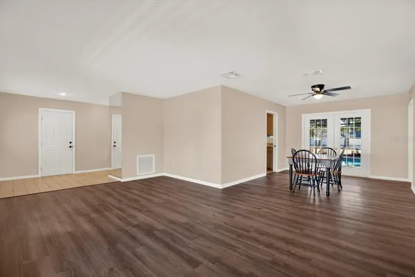 a view of a livingroom with furniture and wooden floor