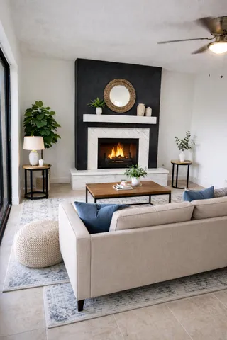 a living room with furniture and a fireplace