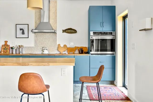 a chair and table in a kitchen