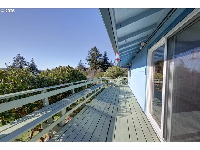 a view of a town with palm trees