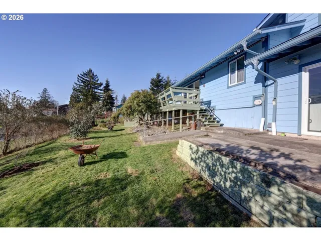 a backyard of a house with lots of green space
