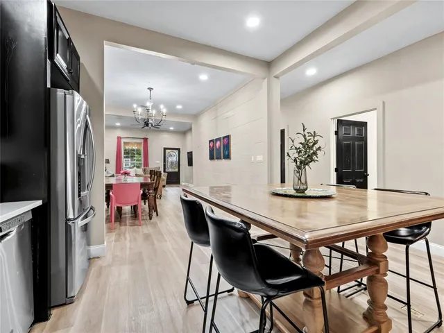 a view of a dining room with furniture