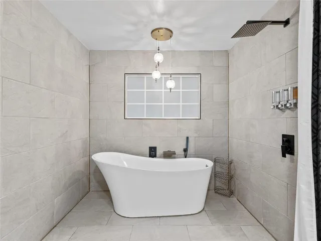 a bathroom with a bathtub