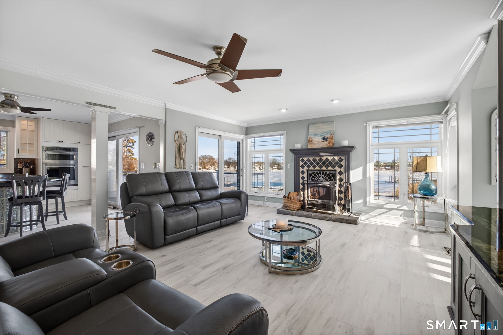 47 Oswegatchie Hills Road East Lyme, CT 06357 - Photo 7 of 40 Open Living Room and Dining Room with Panoramic Water Views.