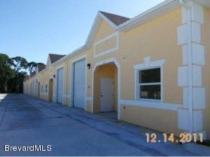 624 Atlantis Road, Unit 101 Melbourne, FL 32904 - Photo 2 of 2 a view of entryway and hall with wooden floor