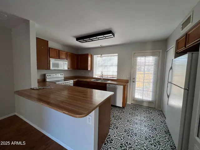 a bathroom with a sink and vanity