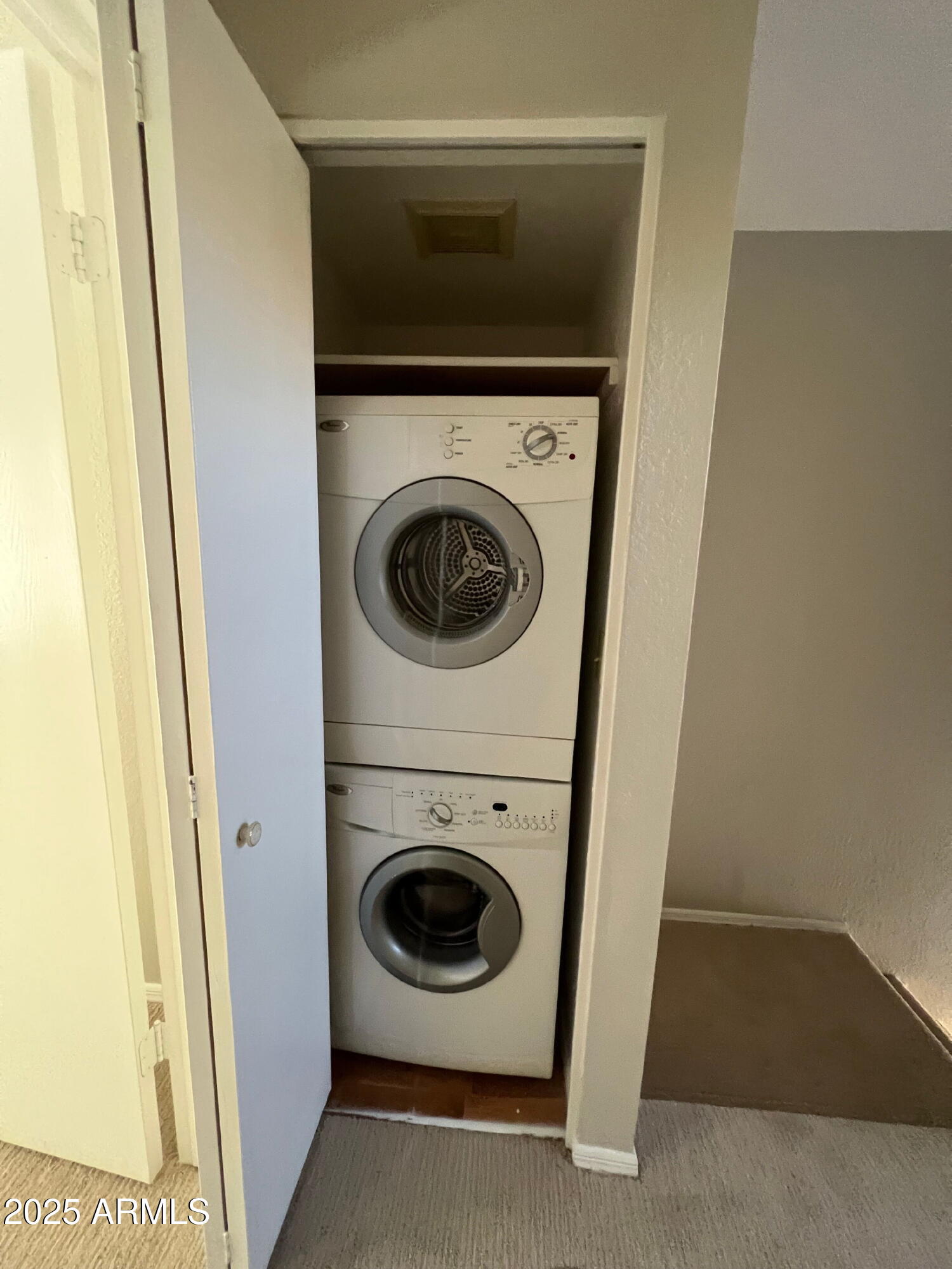 5704 East Aire Libre Avenue, Unit 1081 Scottsdale, AZ 85254 - Photo 13 of 18 a utility room with dryer and washer