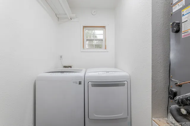 a utility room with dryer and washer