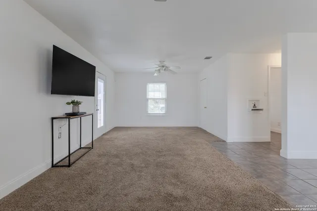a view of a livingroom with a flat screen tv