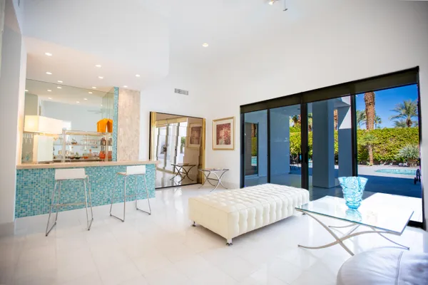 a bedroom with a bed and a couch