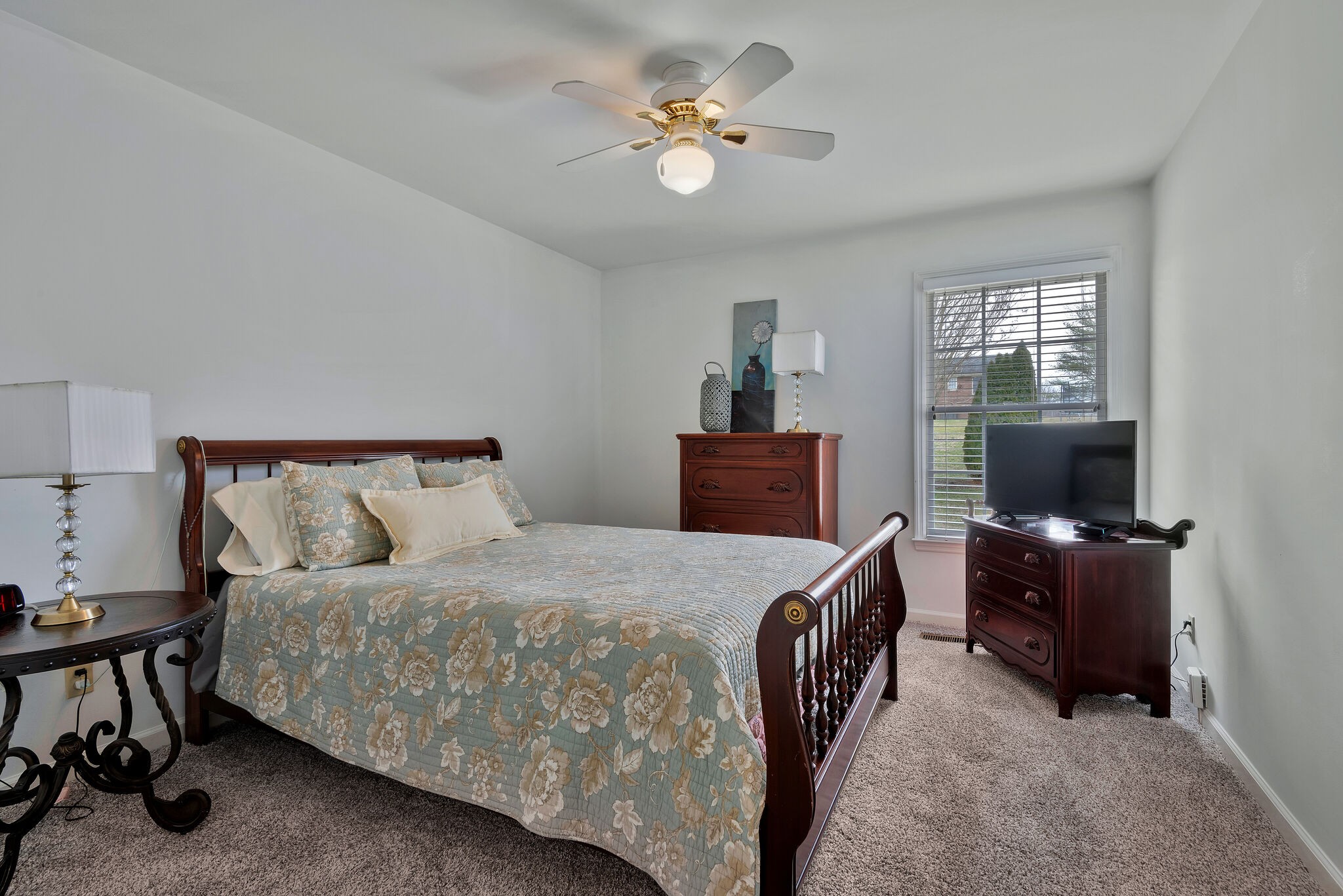 1102 High Lake Drive Dickson, TN 37055 - Photo 26 of 50 a bedroom with a bed and a flat screen tv