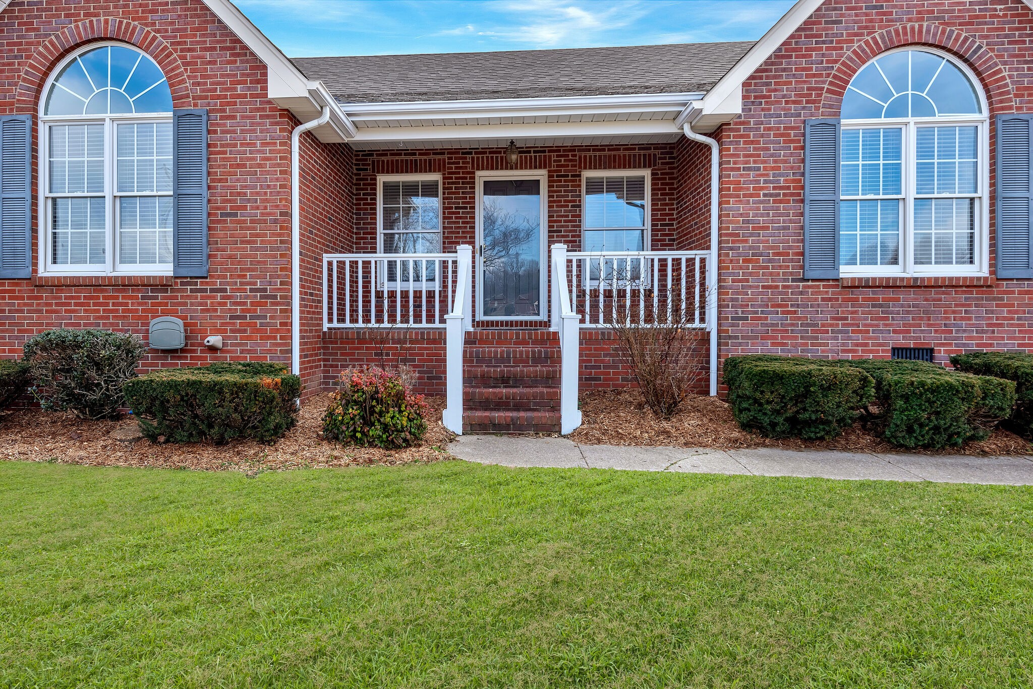 1102 High Lake Drive Dickson, TN 37055 - Photo 3 of 50 a front view of a house with garden