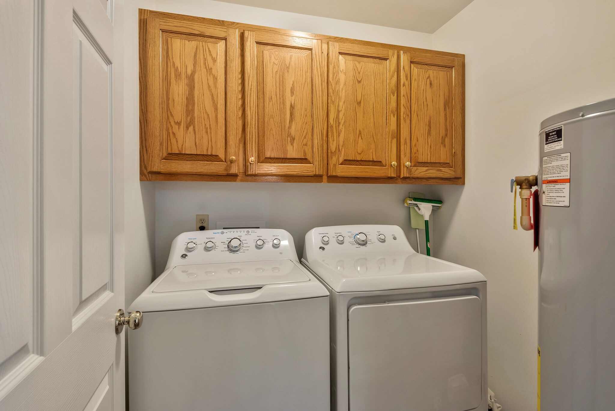 1102 High Lake Drive Dickson, TN 37055 - Photo 32 of 50 a utility room with dryer and washer