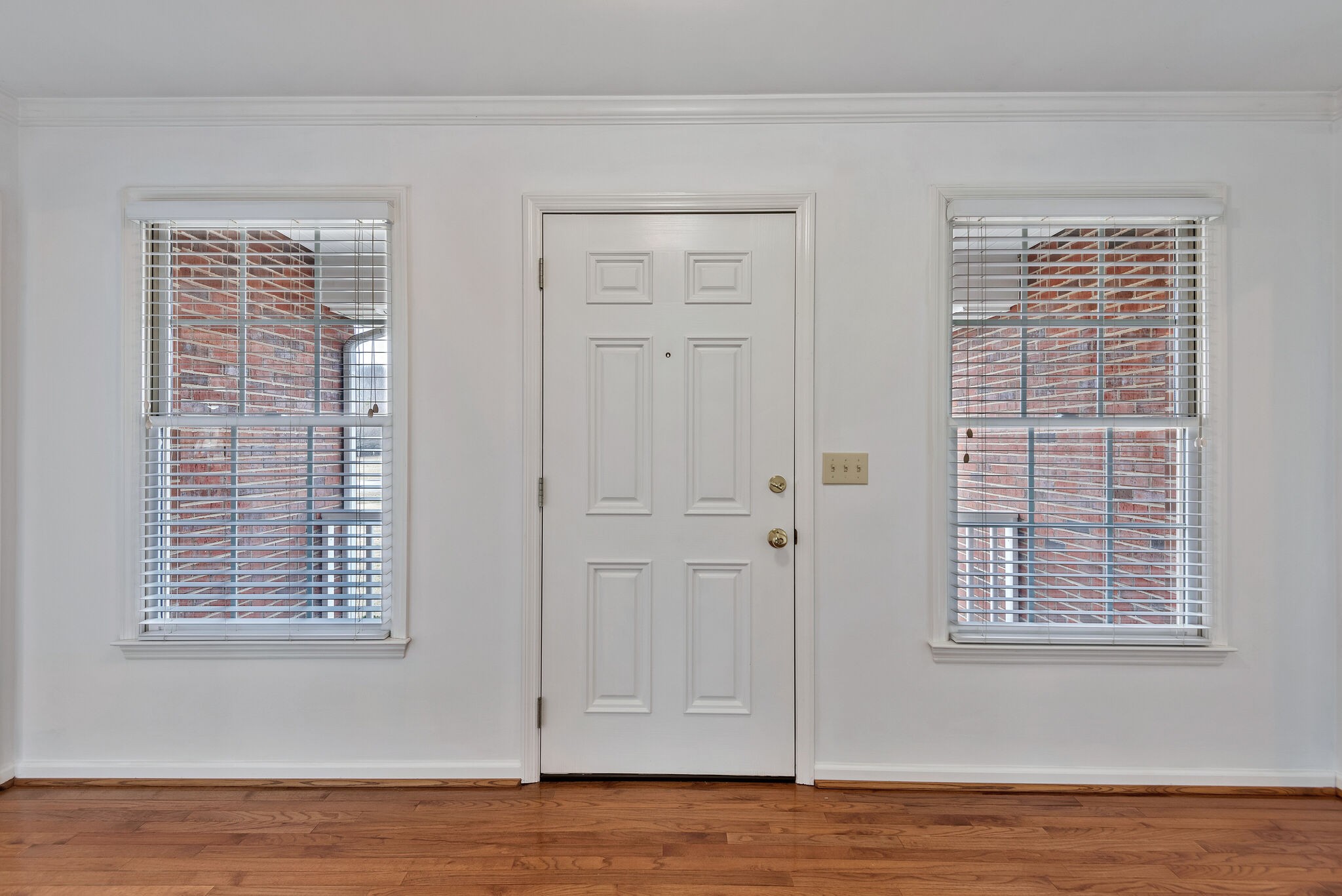 1102 High Lake Drive Dickson, TN 37055 - Photo 33 of 50 a view of an empty room with window and wooden floor