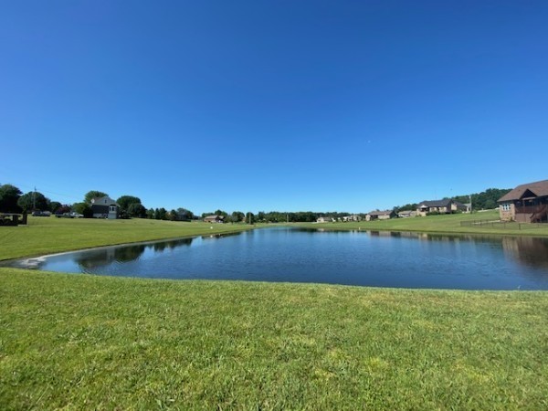 1102 High Lake Drive Dickson, TN 37055 - Photo 42 of 50 a view of lake with green yard