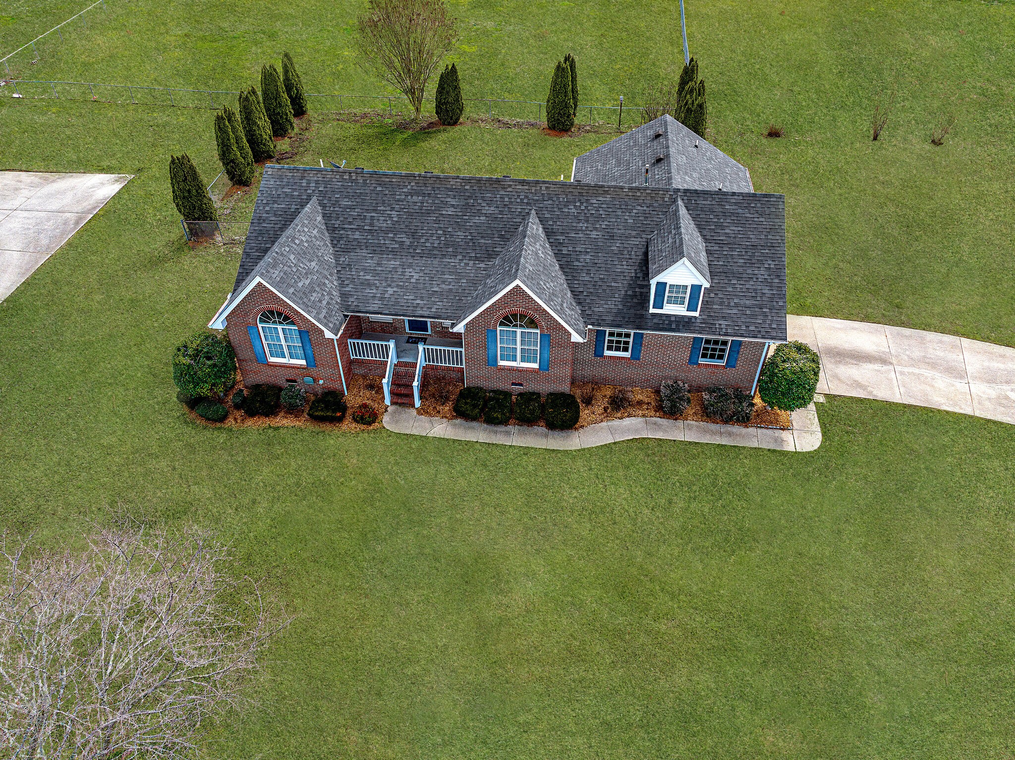 1102 High Lake Drive Dickson, TN 37055 - Photo 5 of 50 an aerial view of a house with a garden