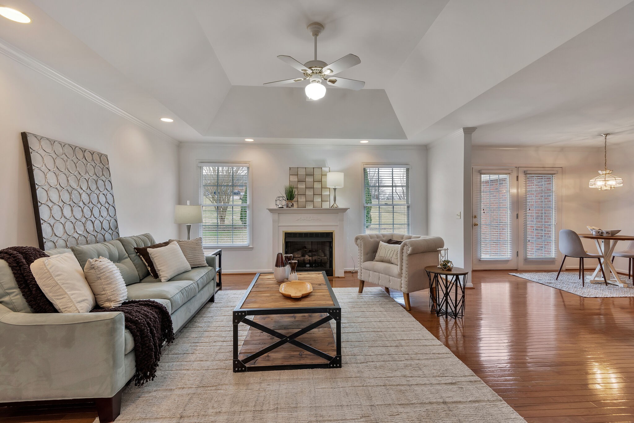 1102 High Lake Drive Dickson, TN 37055 - Photo 6 of 50 a living room with furniture a fireplace and wooden floor