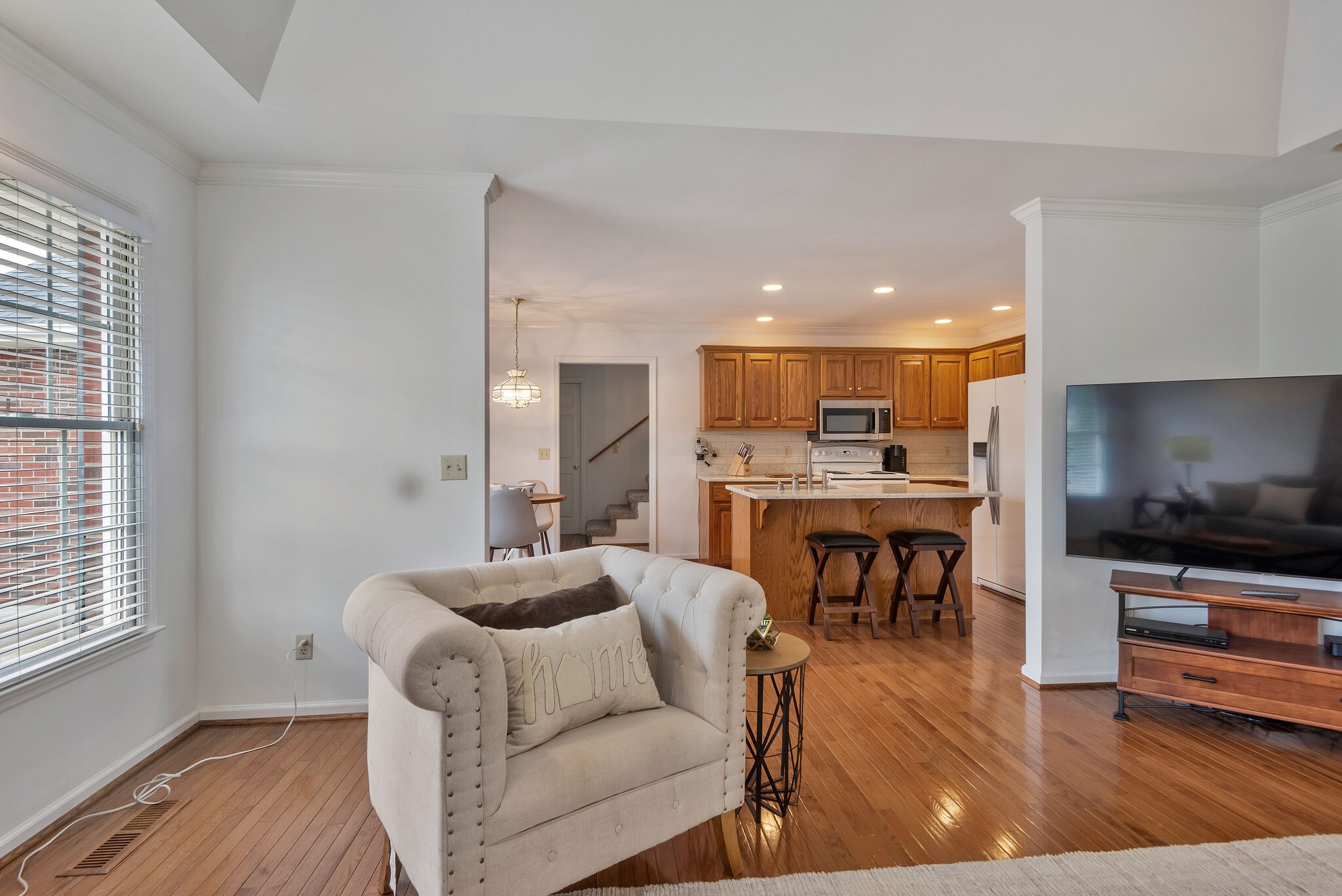 1102 High Lake Drive Dickson, TN 37055 - Photo 10 of 50 a living room with furniture and a flat screen tv