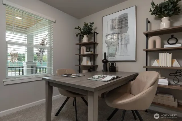 a bedroom with a bed and a night stand