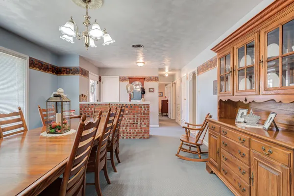 a view of a dining room with furniture