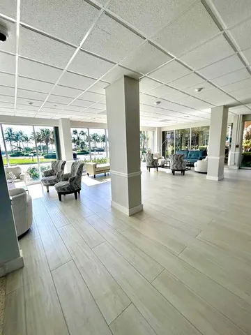 a view of a living room and dining room